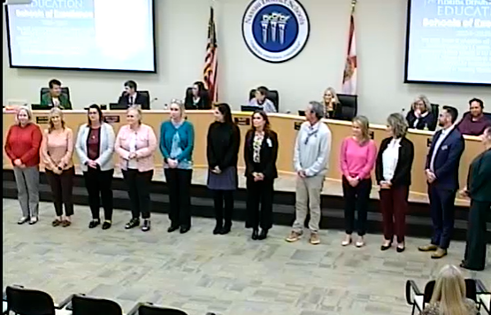 School board approves union contracts, honors schools of excellence
