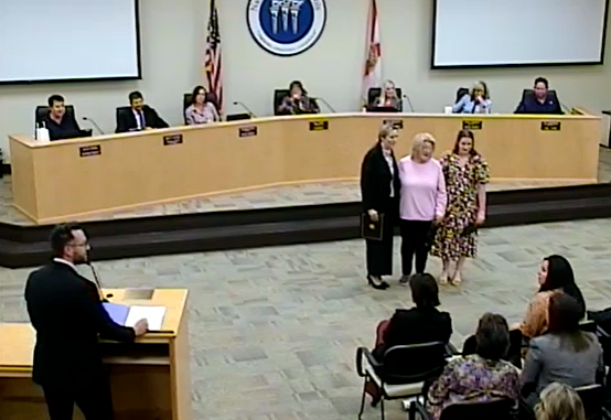 Board OKs military regalia, honors top volunteers