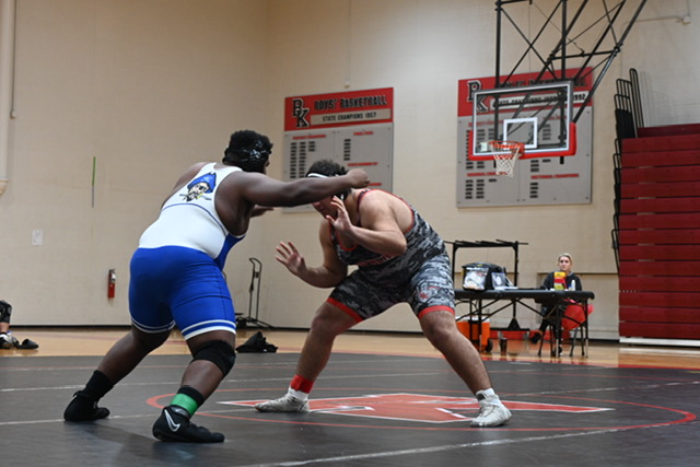 Pirates edged by Crusaders, wrestle in county tournament at Yulee Thursday