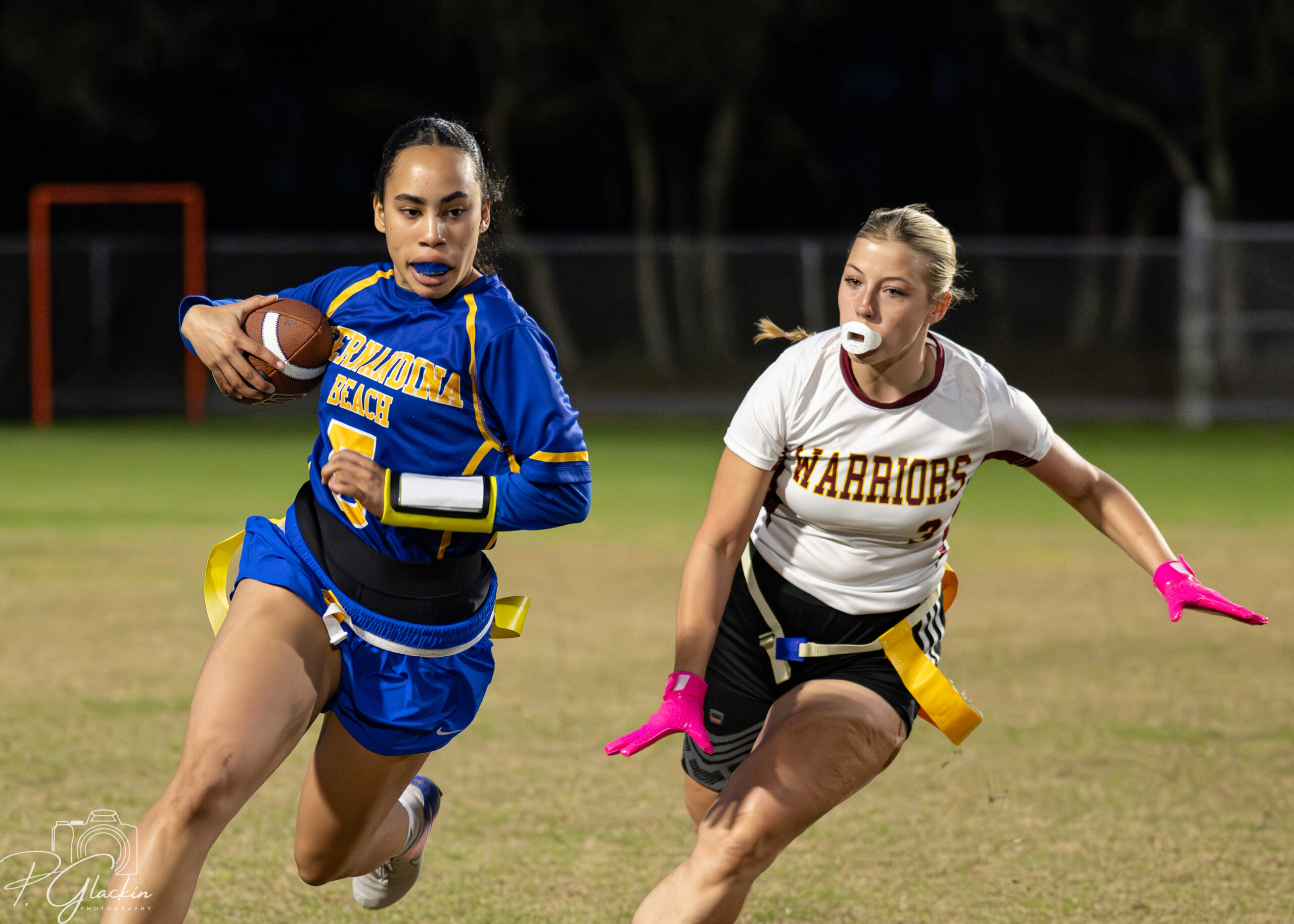 Pirates battle Warriors on home turf The Fernandina Beach High School flag football team hosted West Nassau on Wednesday. Photo by Penny Glackin