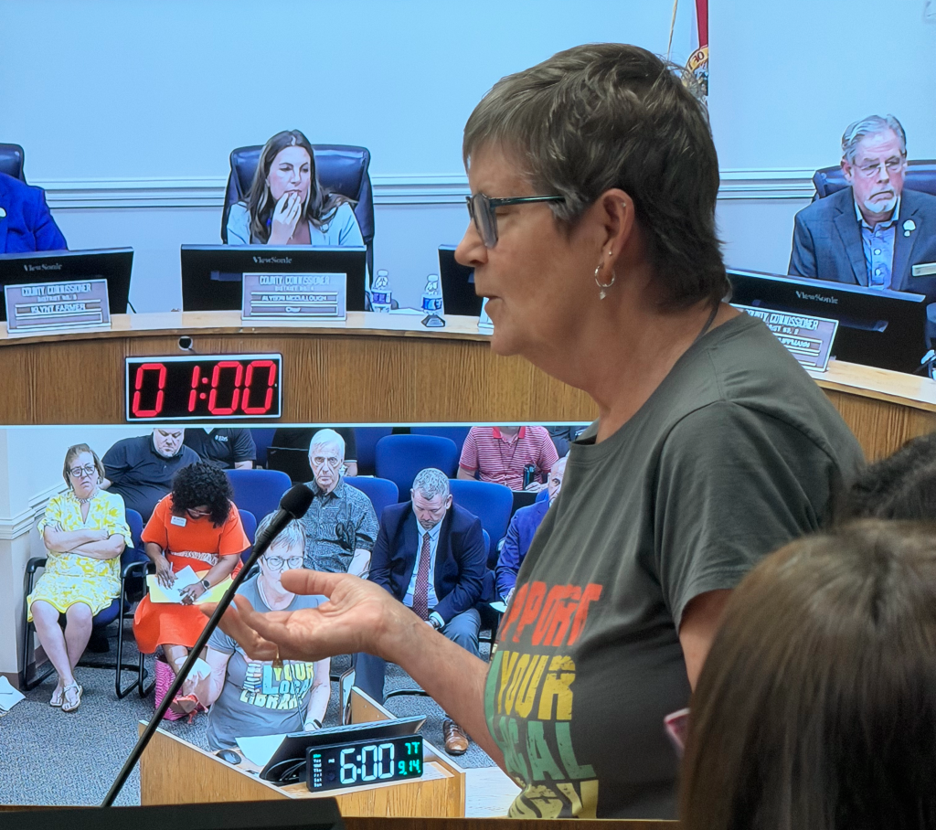 Angie Hall, president of the Friends of the Bryceville Branch Library, urges Nassau County commissioners to keep the library open during public comment at the Sept. 14 budget hearing. Photo by Tracy McCormick-Dishman