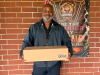 From food services to front doors: Nassau schools deliver food to families in need Officer Caldwell prepares to deliver food. Photo courtesy Nassau County School District
