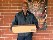 From food services to front doors: Nassau schools deliver food to families in need Officer Caldwell prepares to deliver food. Photo courtesy Nassau County School District