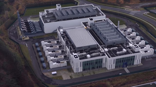 A data center, like the facilities Nassau County is studying under its temporary moratorium, features rooftop cooling equipment and rows of backup generators.